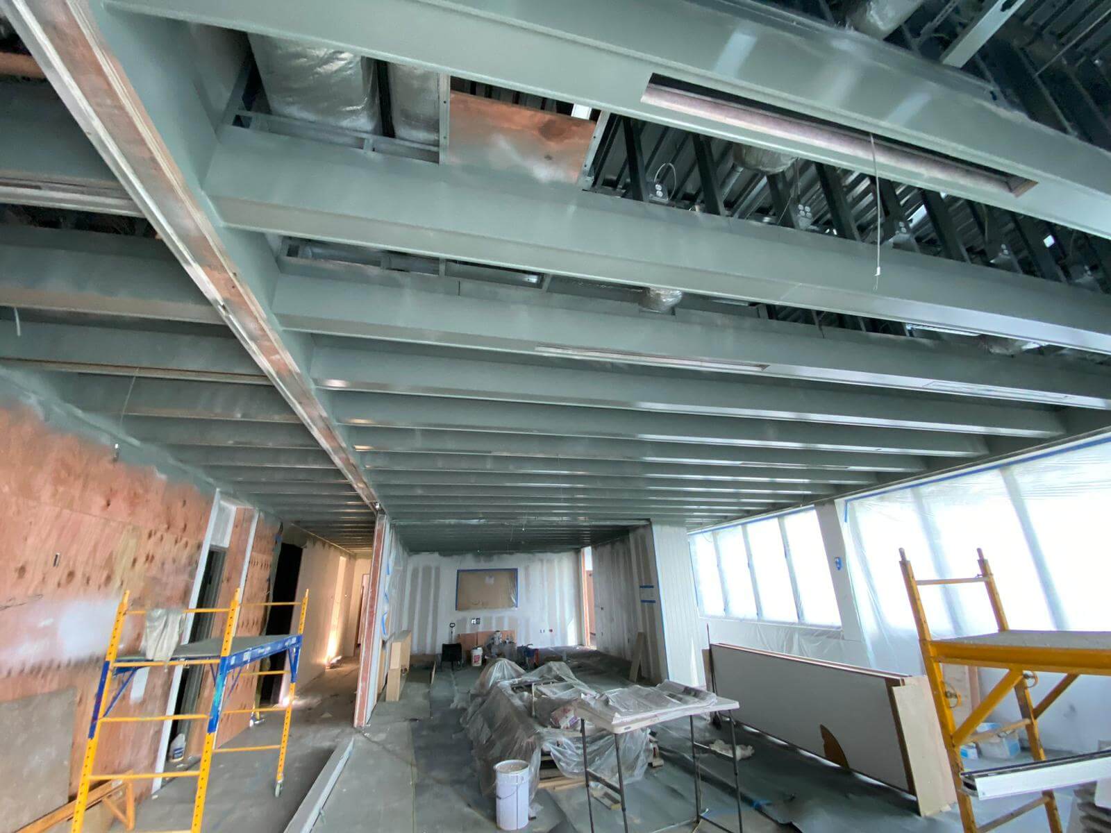 Steel ceiling framing and ductwork inside a commercial space